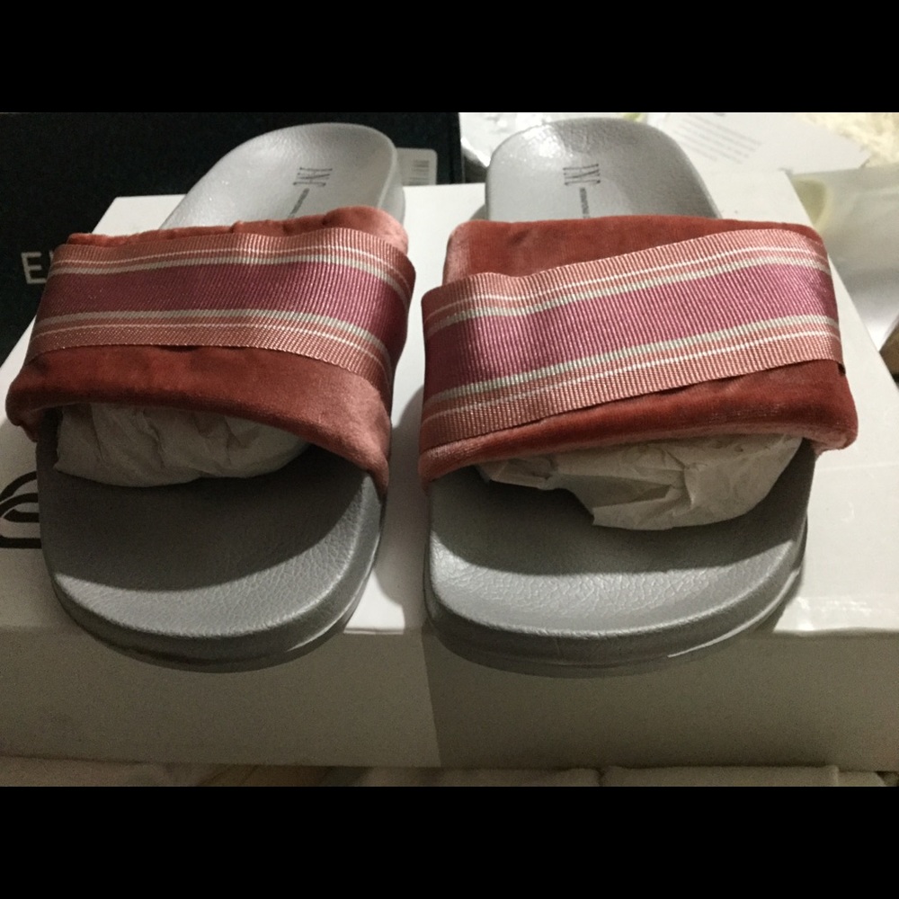 New International Concepts slippers.